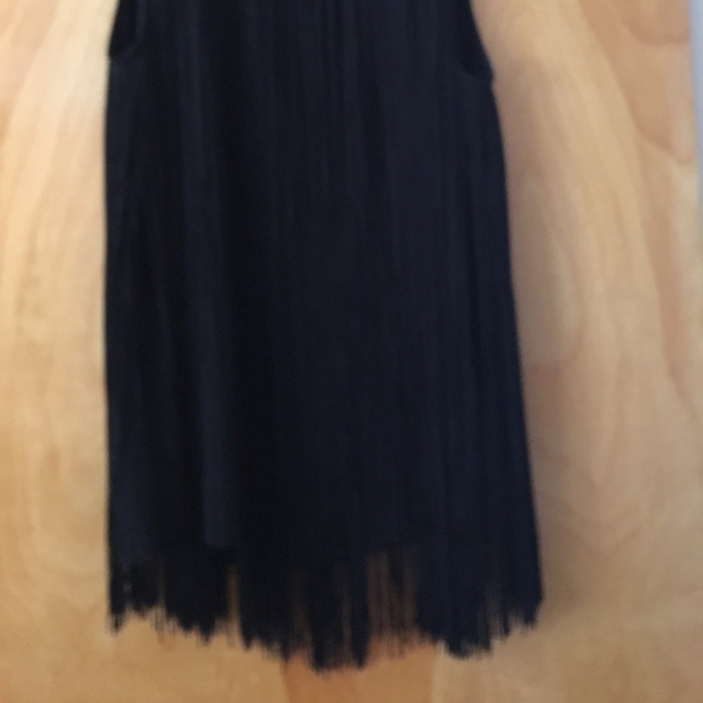 sleeveless fringed long tank type top
